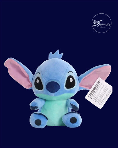 Plava plišana igračka Stitch sa roze ušima, sjedi