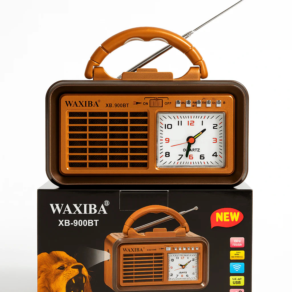 Retro prijenosni radio sa analognim satom ispred originalne kutije