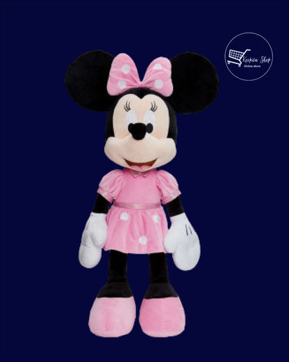 Velika plišana Minnie Mouse u roze haljini na tamnoj pozadini